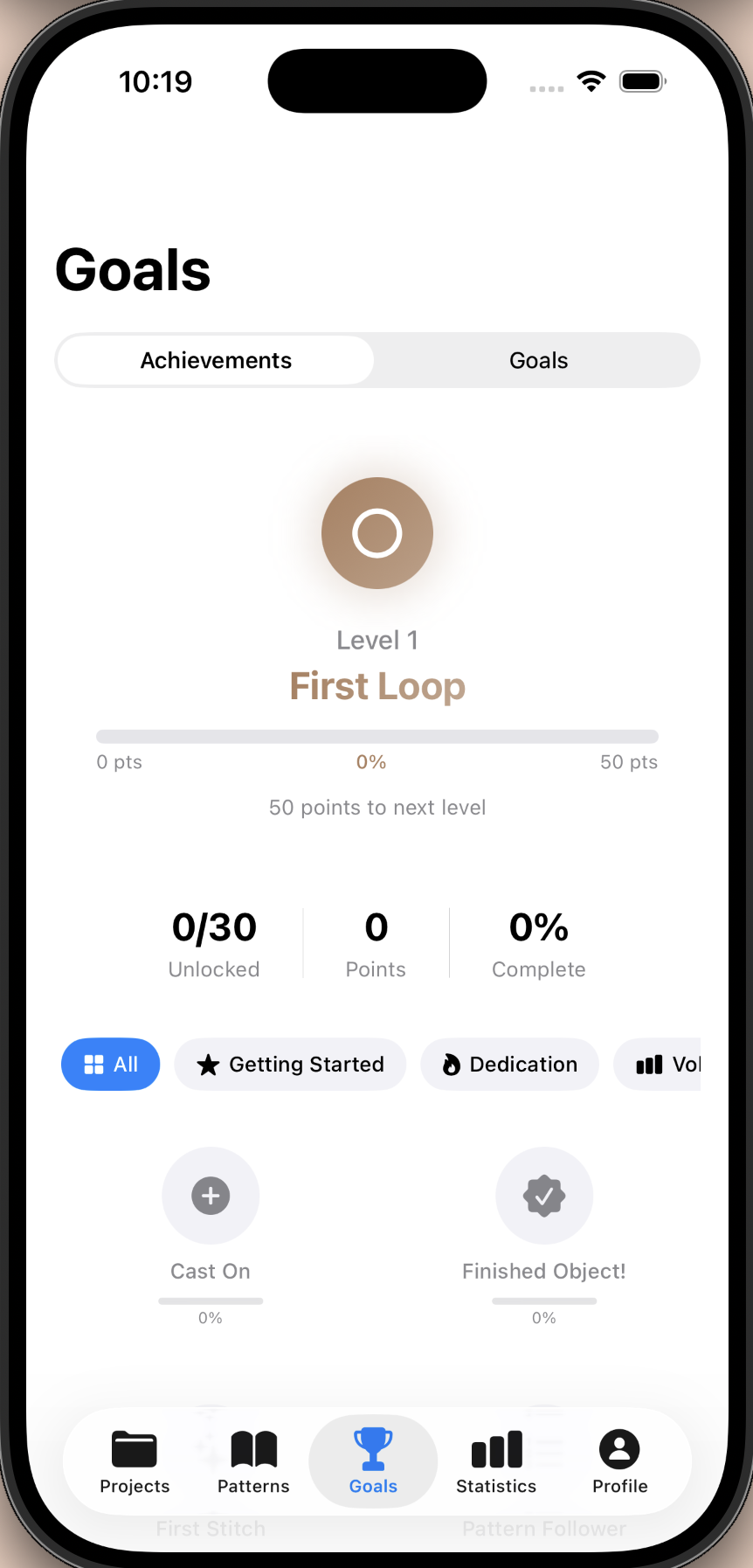 Yarnie achievements screen showing unlocked badges like First Stitch, Streak Master, and Yarn Legend